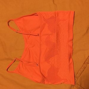 Bright orange top